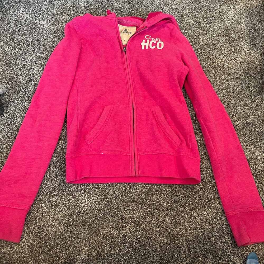 Hollister hoodie with hollister down the left arm